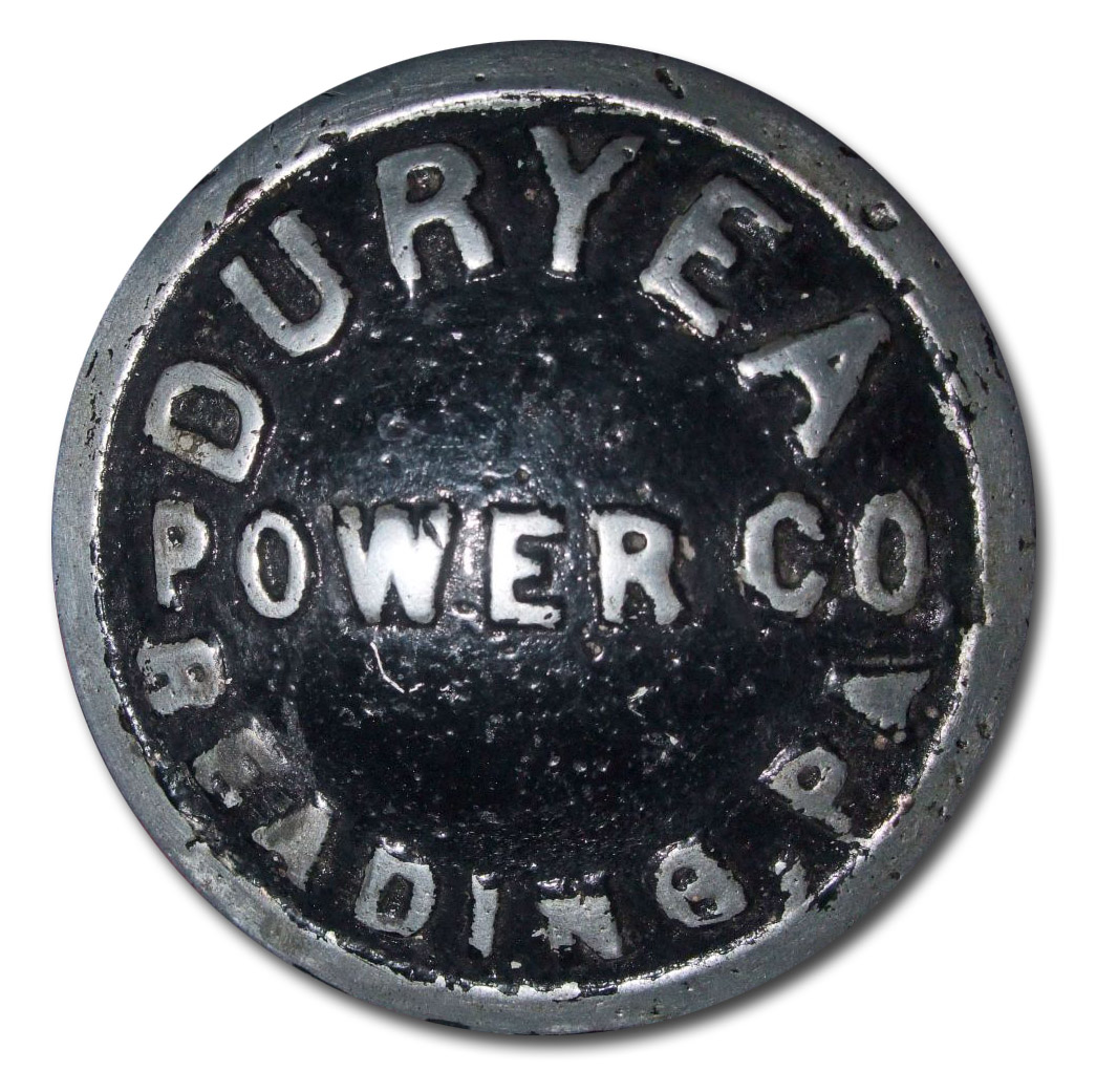 1904. Duryea Power Company (1904 wood wheel hubcap)